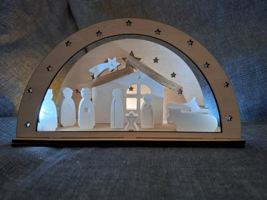 Weihnachtskrippe mit Holzbogen