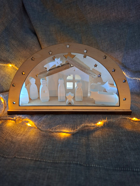 Weihnachtskrippe mit Holzbogen